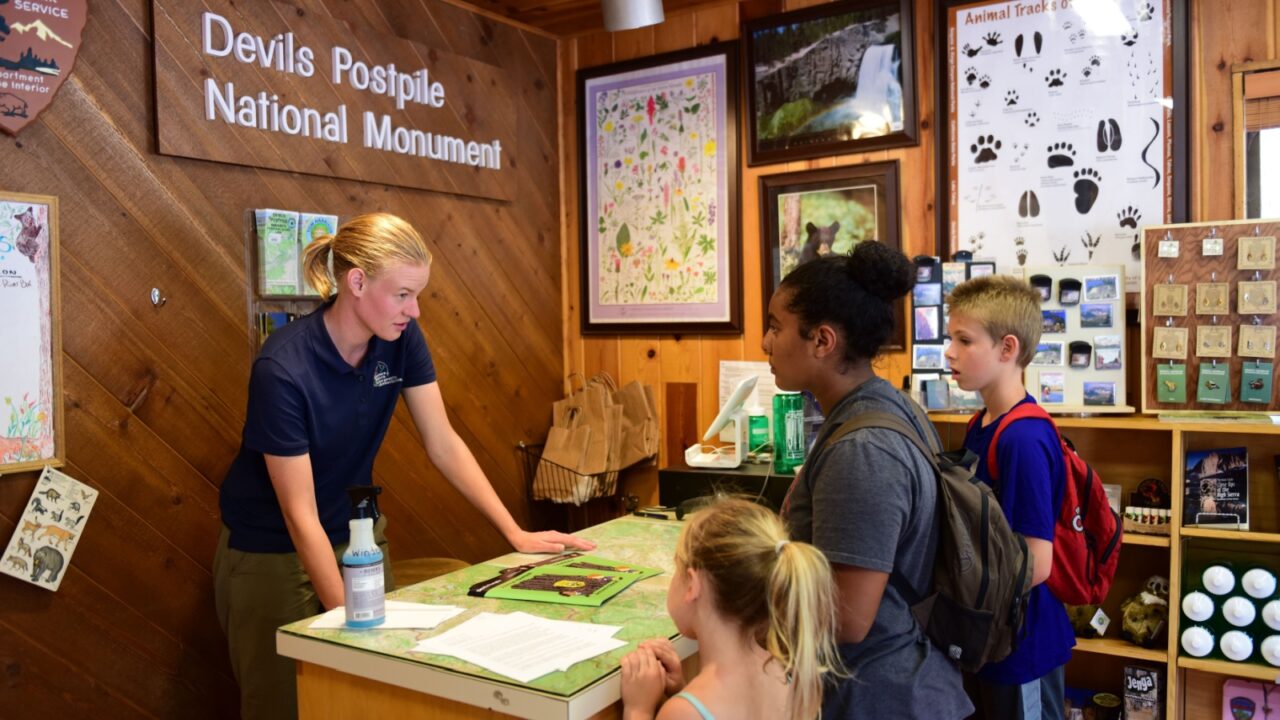 Mammoth Lakes, CA USA - July 25, 2018: Children sign up for the Junior Ranger Program at Devils Postpile National Monument Visitor Center.