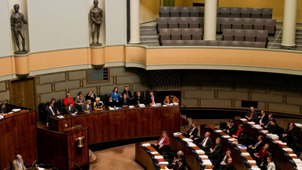 HELSINKI,FINLAND-MARCH 18: Plenary session at Plenary Room of Finnish Parliament, in front of the room sits Government of Finland on March 18, 2010 in Helsinki, Finland