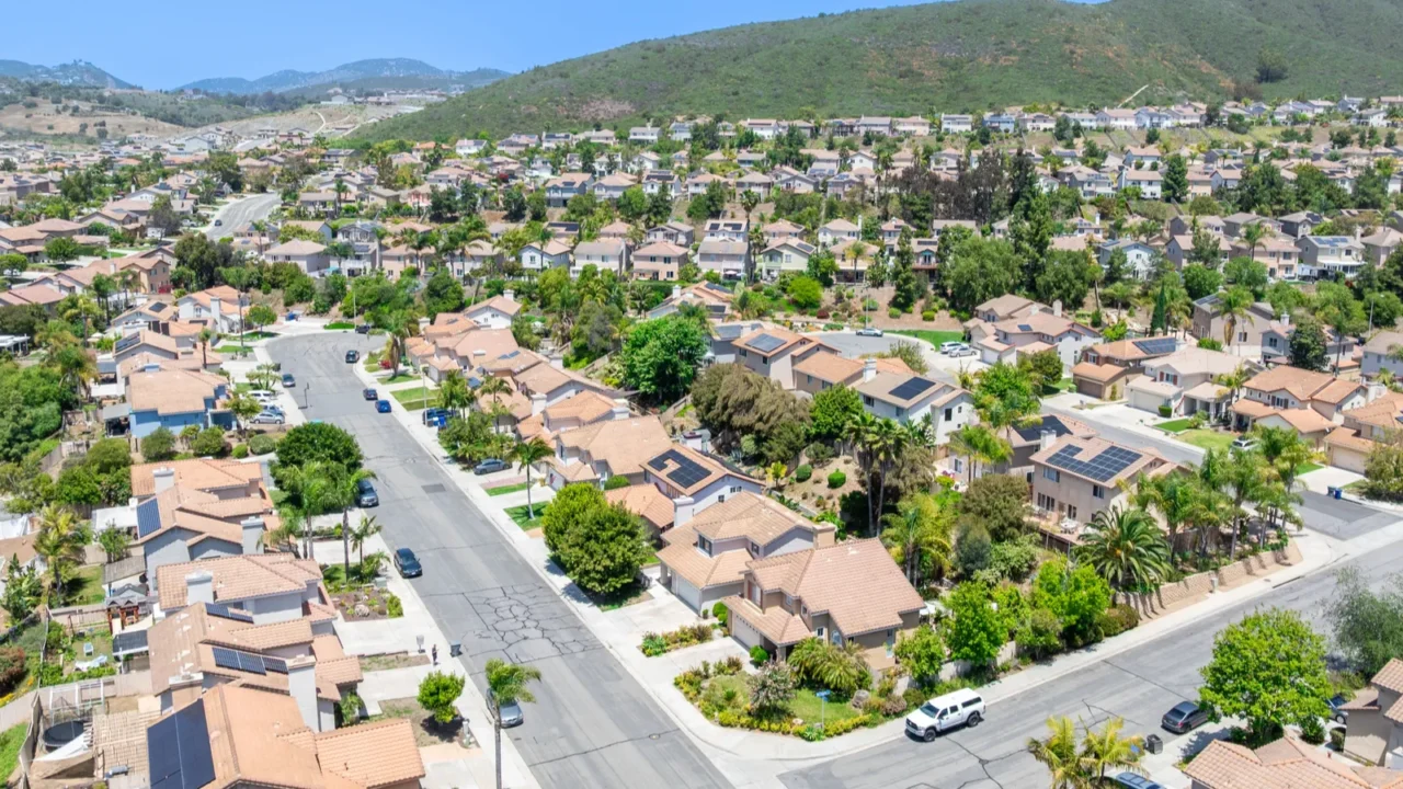 aerial view of san marcos neighborhood with houses and street