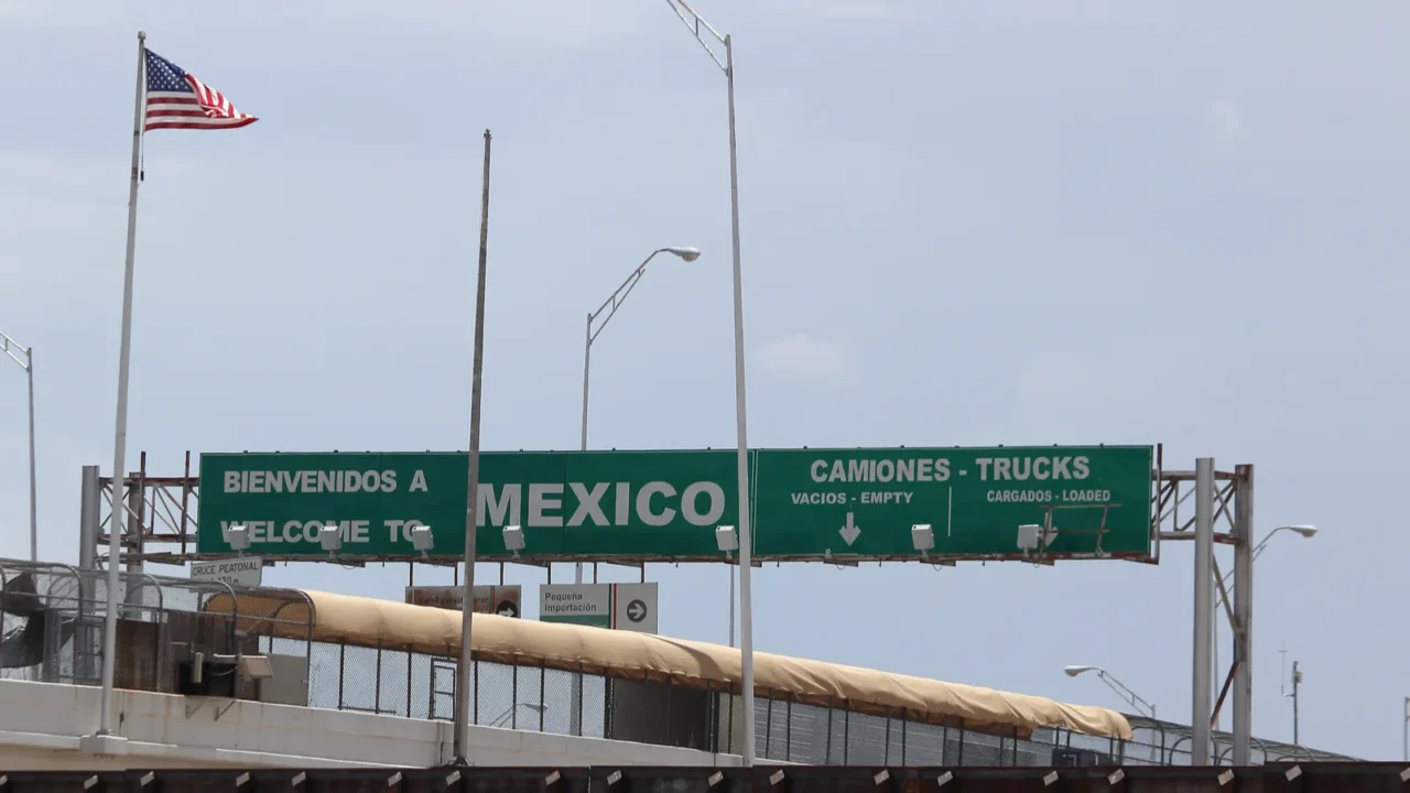 border of mexico and the united states with flags and