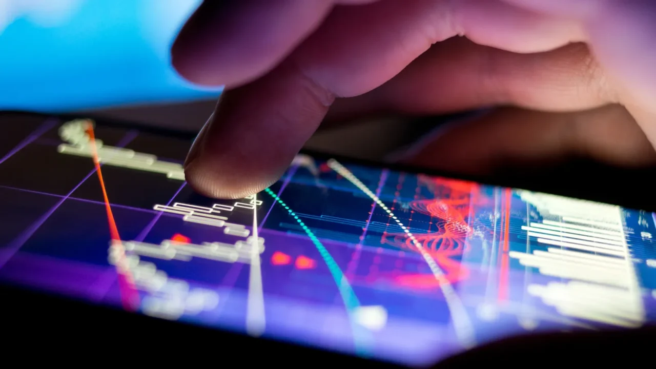 businessman checking stock charts