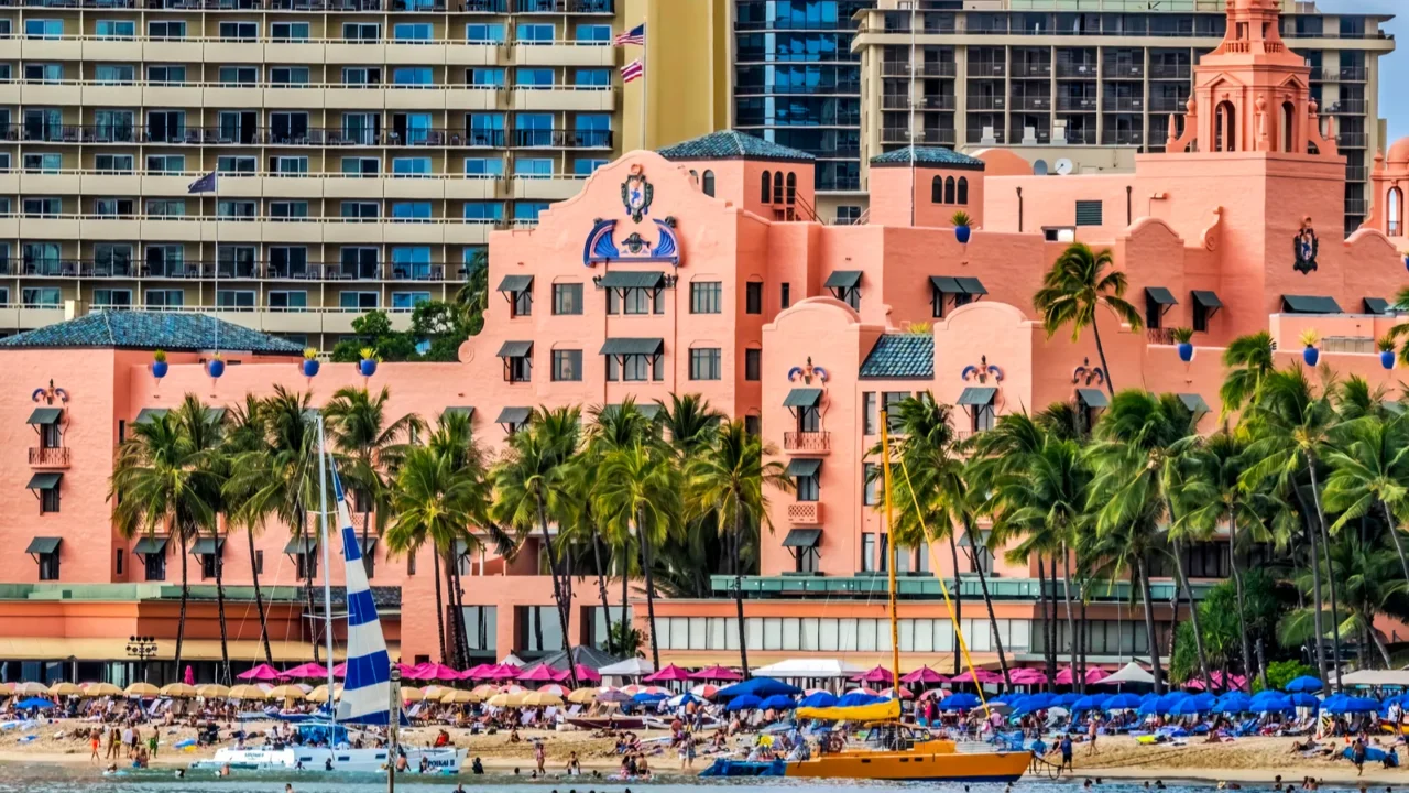 colorful old hotel buildings swimmers waikiki beach hotels honolulu hawaii