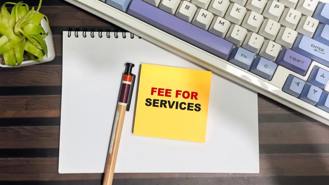 concept of fee for services write on sticky notes isolated