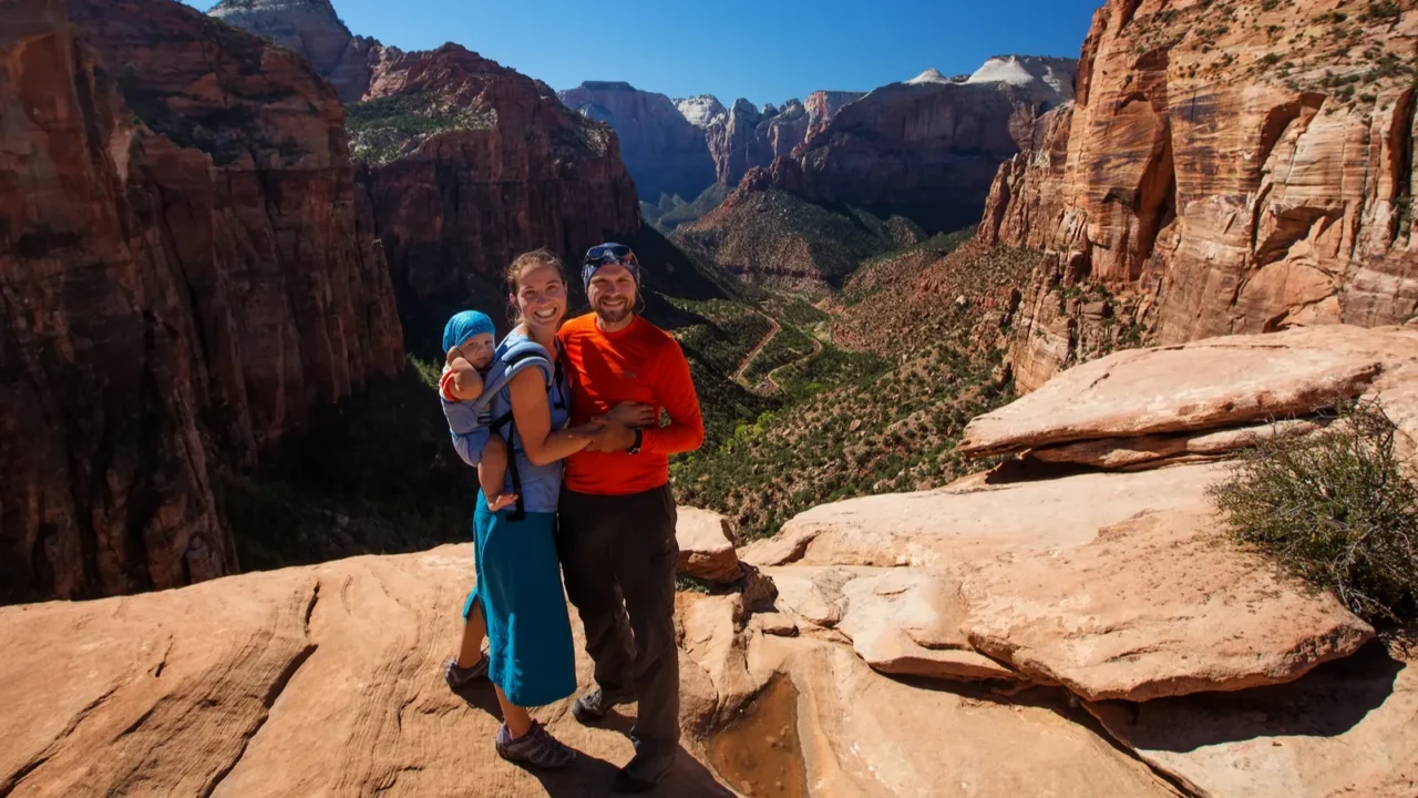family with their baby son visit zion national park in
