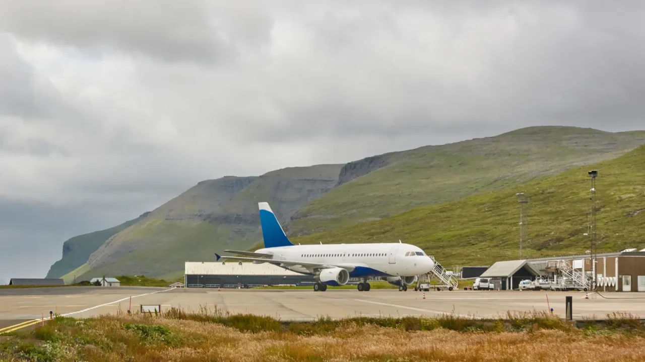 faroe islands airport runway and control tower with airplane travel