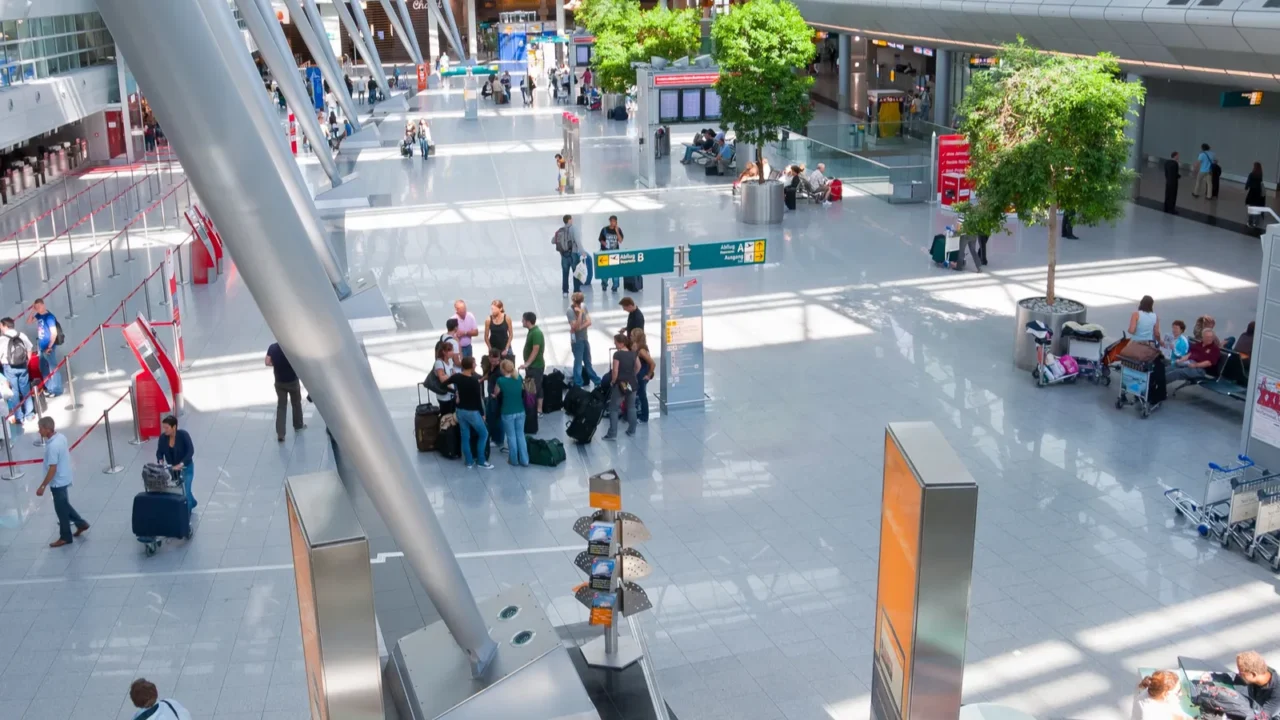 interior of modern international airport no recognizable faces and advertising