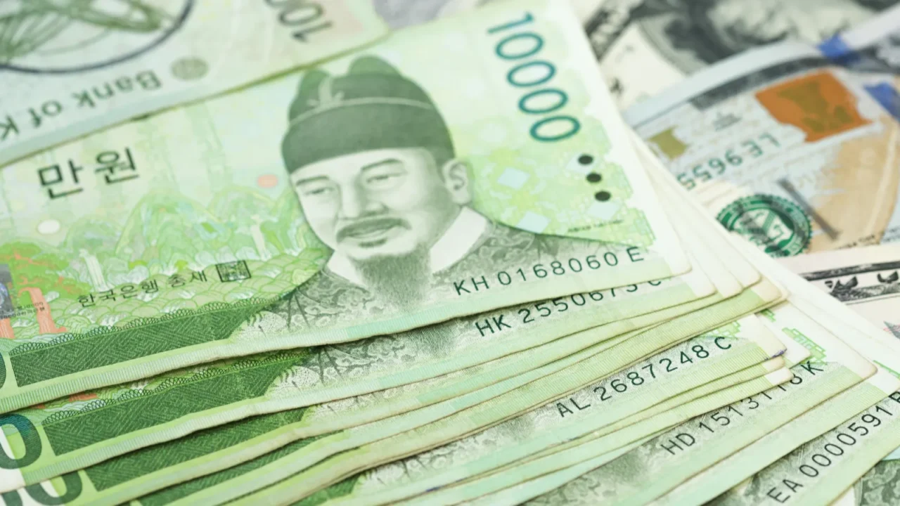 korean won and us dollar bills for money background in