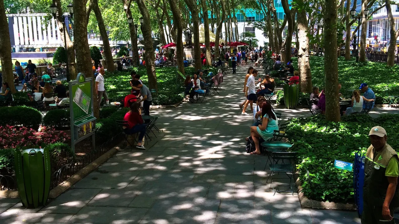 large numbers of people relaxing on a beautiful day in