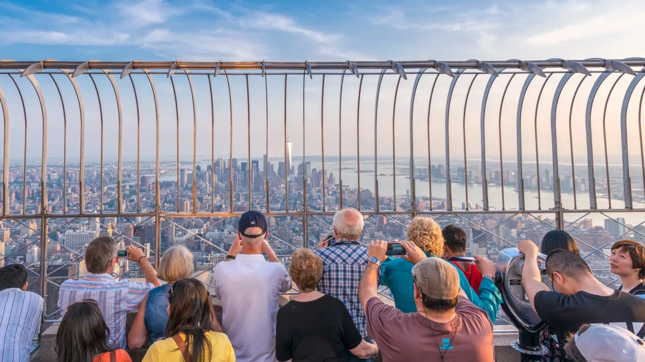 new york city  june 9 2013 tourists enjoy manhattan