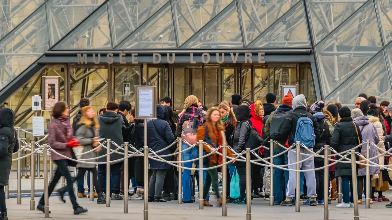 paris france january  2022  people waiting to enter