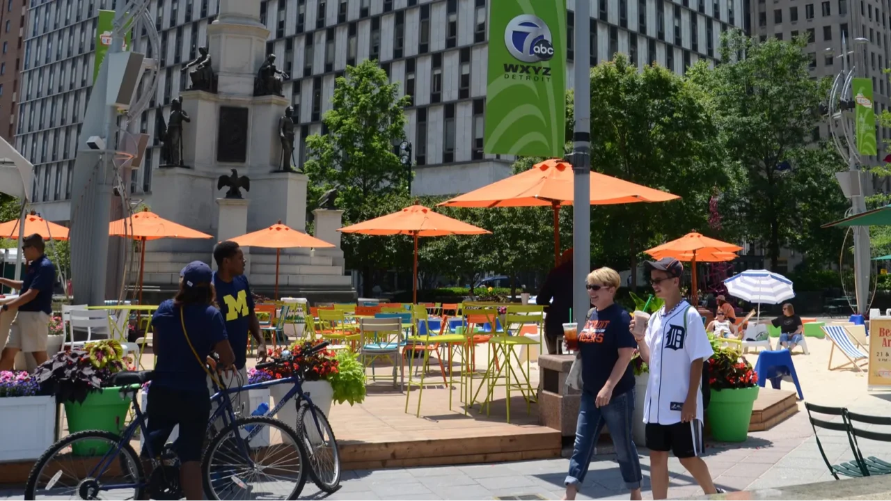 people enjoying campus martius park in detroit mi