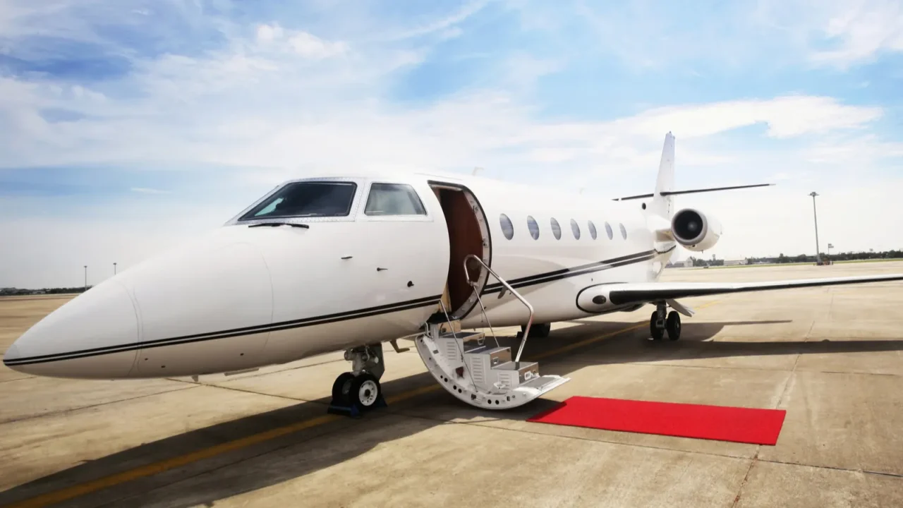 private airplane with red carpet