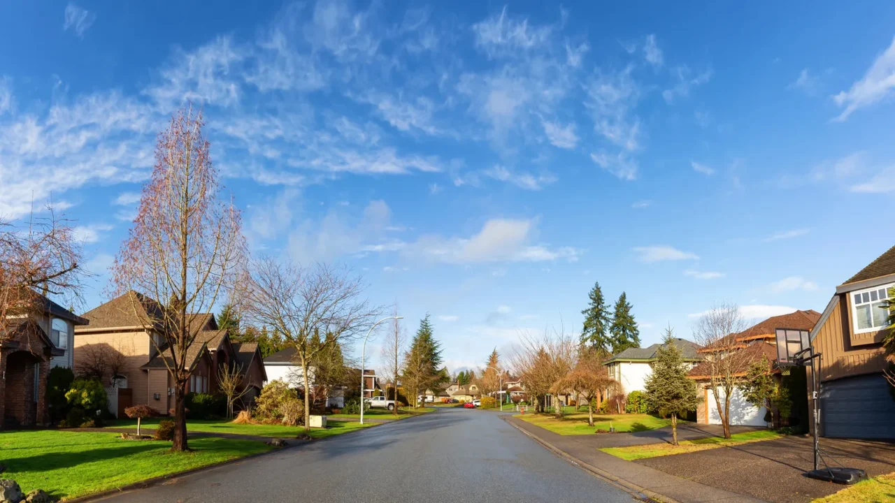 residential suburban neighborhood in the city during a vibrant winter