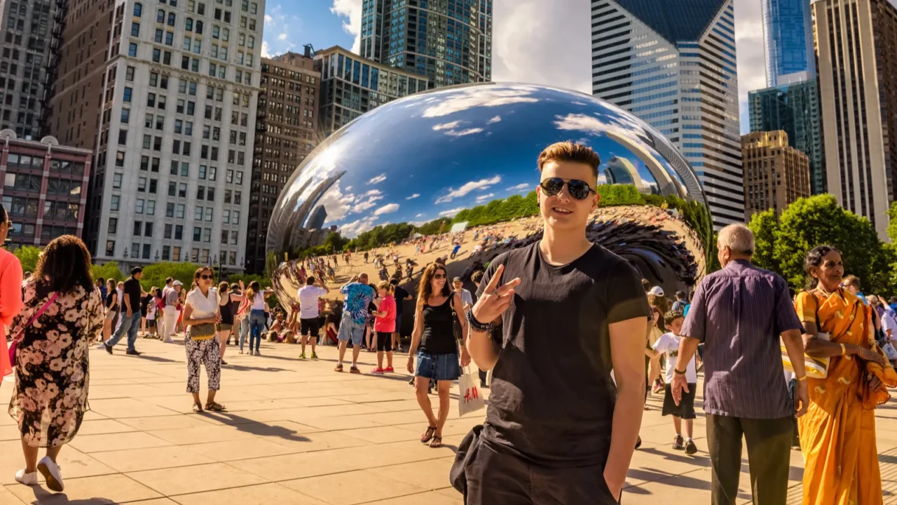 tourists in the millennium park around the cloud gate in