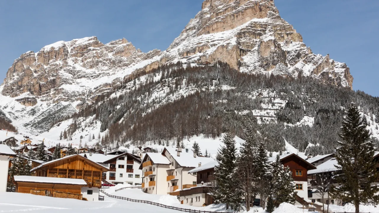 view of colfosco a mountain village and ski area in