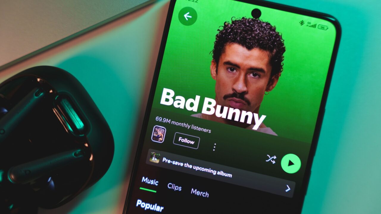 A smartphone displaying Bad Bunny's artist profile on Spotify. January 5, 2025