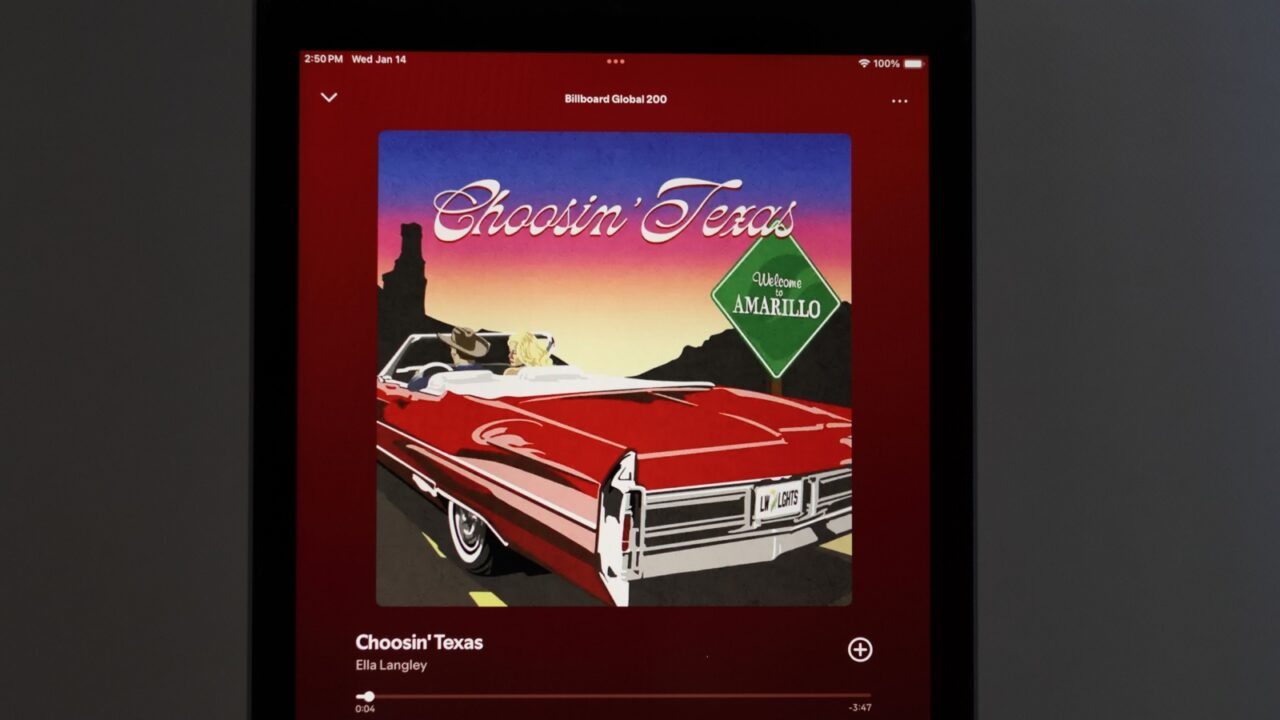 Quezon City, Philippines - 1-14-2026: An Apple iPad displays the Spotify music streaming application, which is playing the song "Choosin' Texas" by the artist Ella Langley. Quezon City, Philippines - 1-14-2026: An Apple iPad displays the Spotify music streaming application, which is playing the song "Choosin' Texas" by the artist Ella Langley.