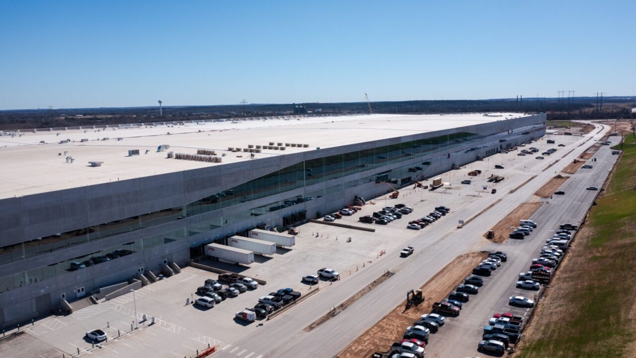 Austin, Texas January 28 2022: Aerial view of Tesla Giga Texas factory during final construction phase. Archive footage of the Model Y assembly plant before the 2026 expansion and Optimus facility.