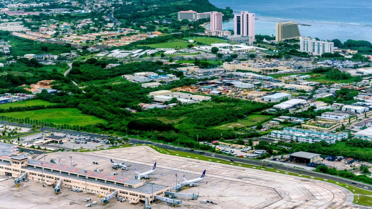 Guam - June 2016: Aerial of Antonio B. Won Pat International Airport and Tumon Bay