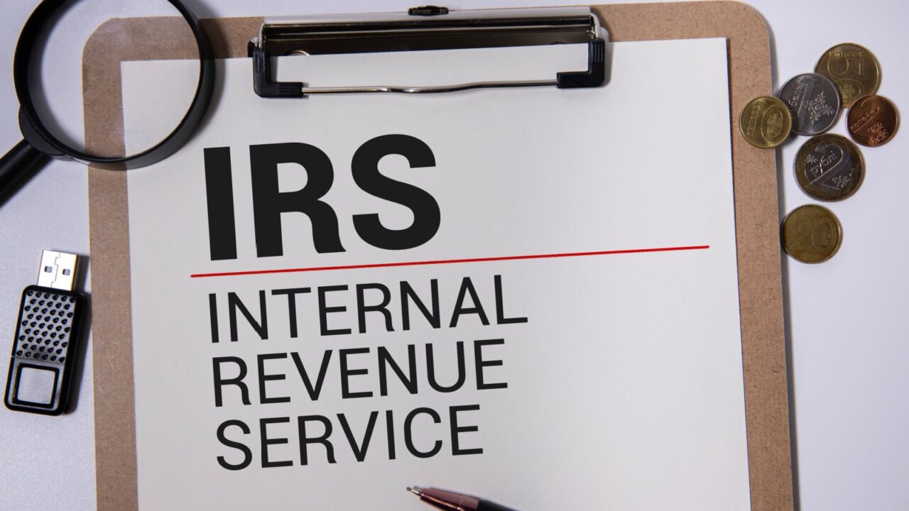 IRS Internal Revenue Service - responsible for collecting taxes and administering the Internal Revenue Code, acronym text stamp