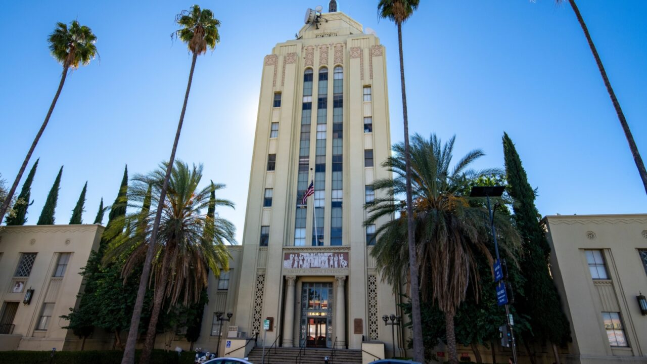 Van Nuys, California, 2025 Nov 26. Valley Municipal Building, Van Nuys City Hall, San Fernado Valley, City of Los Angeles. City government building entrance and bronze plaques, art deco structure.