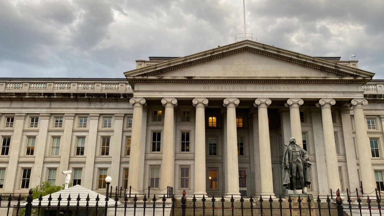23 April 2022 - Washington D.C., United States - Department of the Treasury Building in Washington DC with Alexander Hamilton Statue,