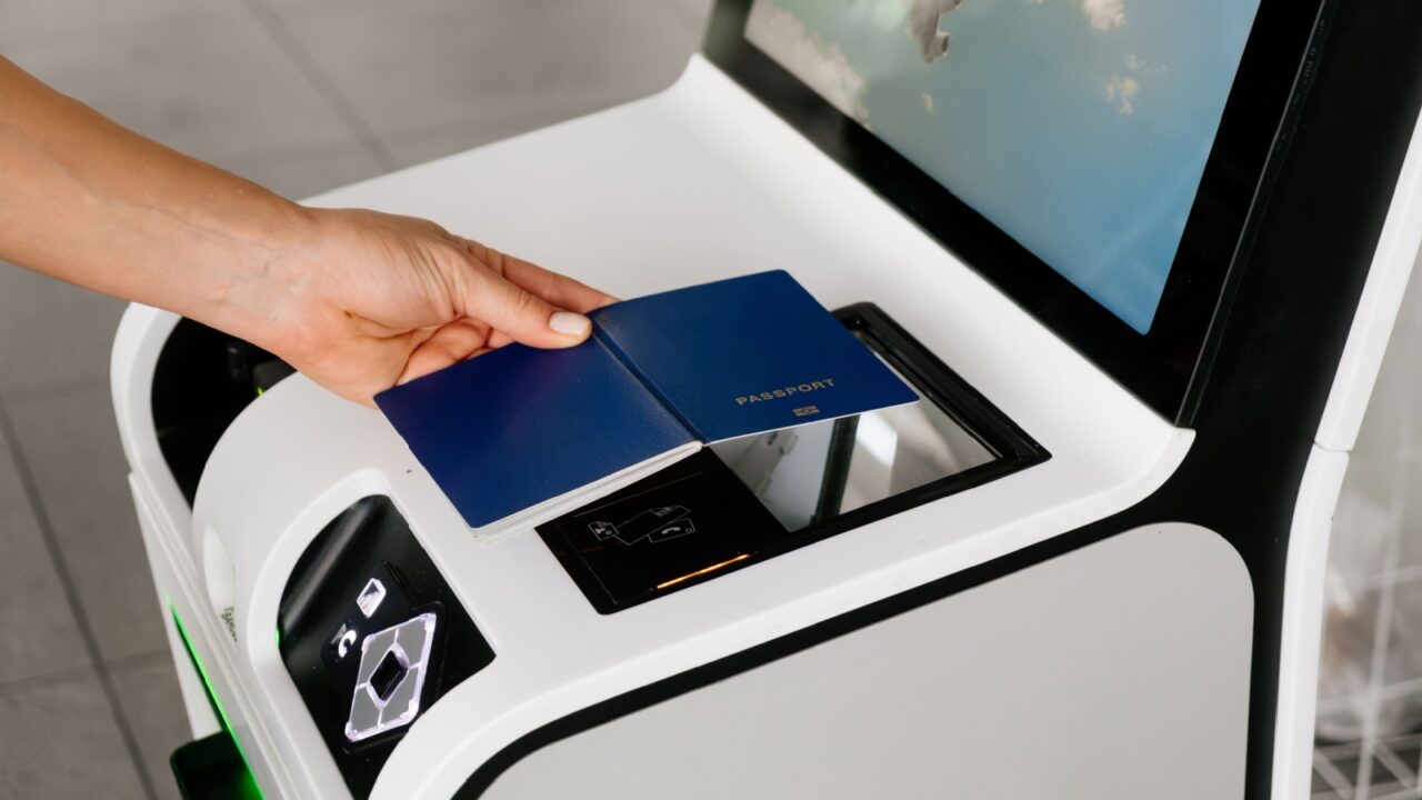 Scan your passport at the self-service check-in counter to receive your boarding pass at the airport terminal.