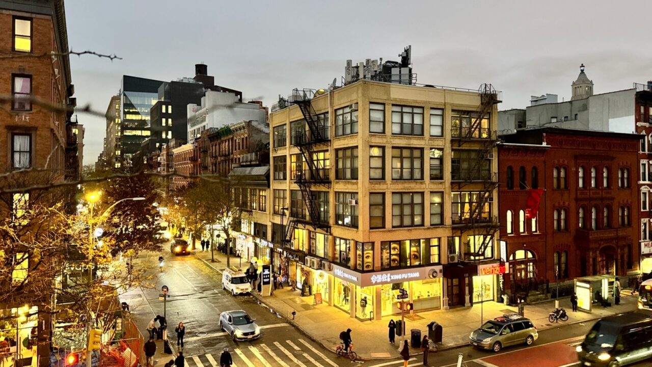 New York, NY USA - December 5, 2025 : Aerial view looking down St. Mark's Place lined with new and pre-war apartment buildings in the early evening in the East Village, Manhattan, New York City