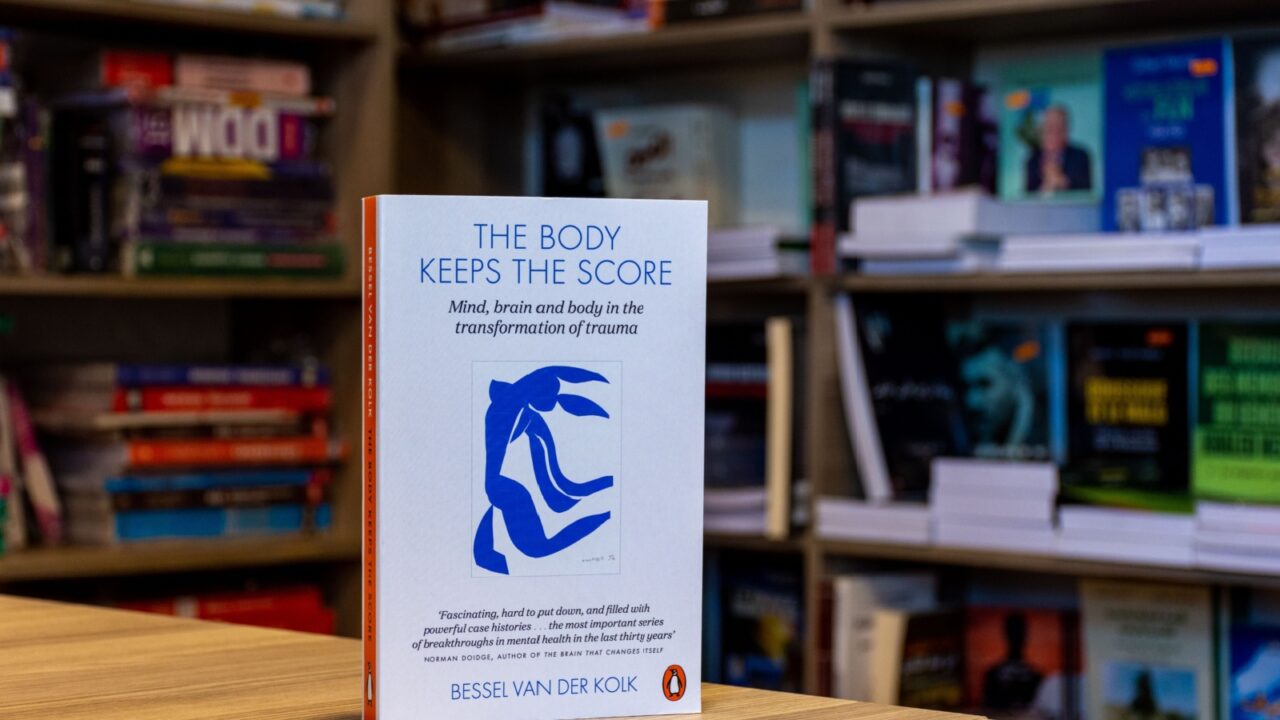 Setif, Algeria - October 07, 2023: Close-up of Bessel van der Kolk's The Body Keeps the Score book in the bookshop.