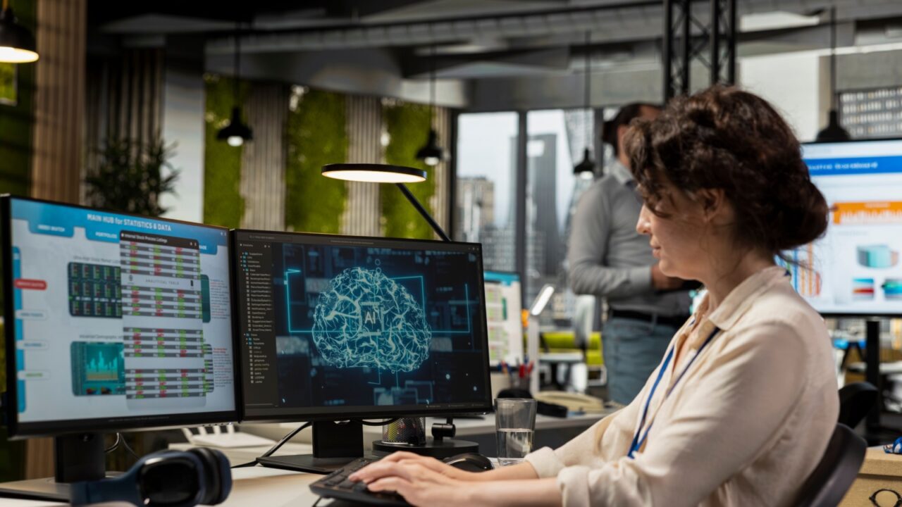 Female IT consultant handles neural networks systems for data forecasting, combining AI automation tools with digitalization to drive multinational company efficiency and innovation.