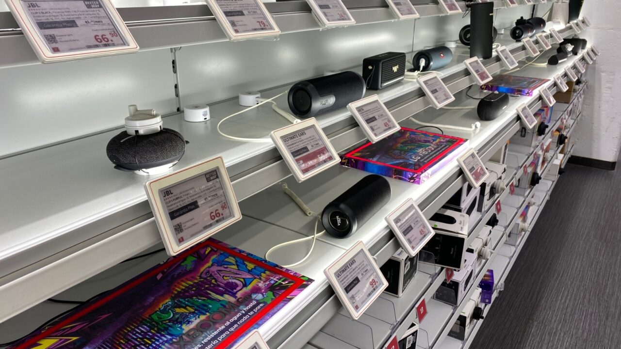 Palma De Mallorca, Spain - July 04, 2025: Array of portable speakers on retail shelves, featuring colorful designs and price tags for shoppers to explore