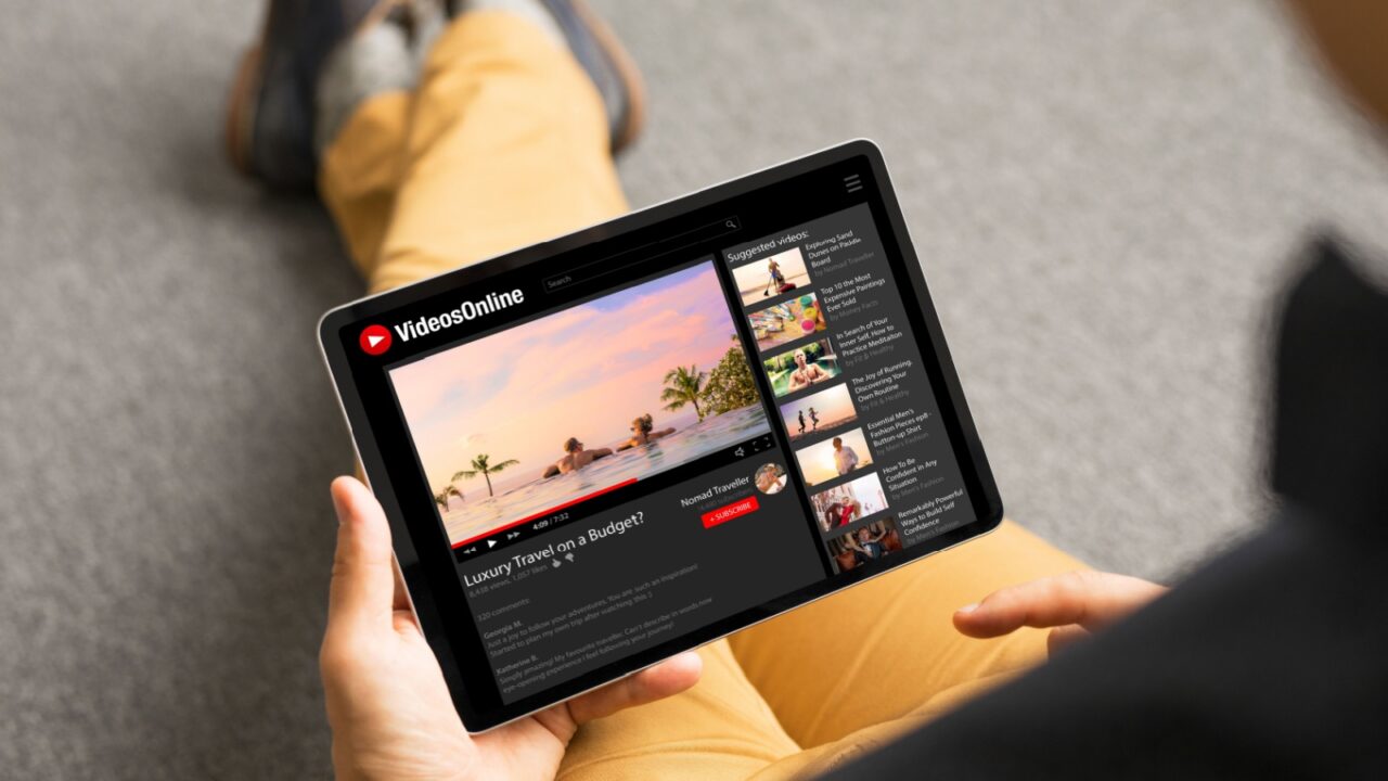 Man watching videos online on tablet