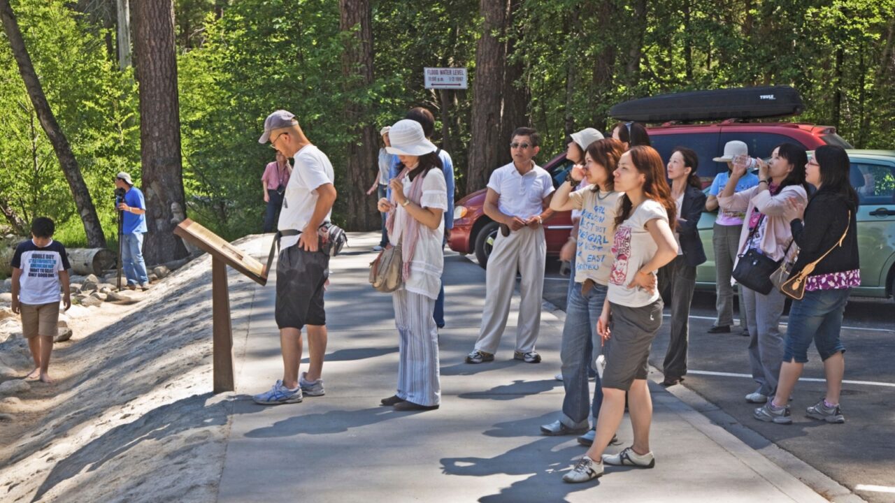 Yosemite national Park, USA - July 22, 2008: people enjoy the yosemite valley by a guided bus tour.