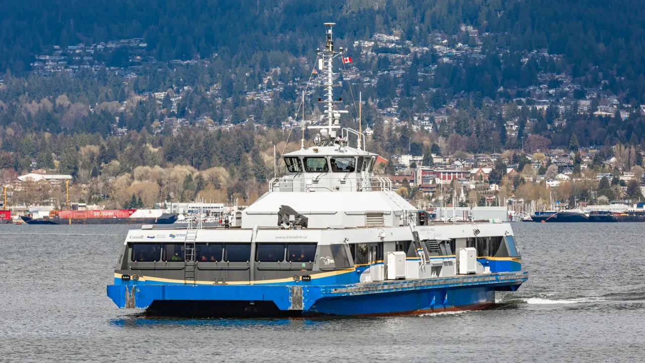 a commuter ferry crosses vancouvers burrard inlet from north vancouver
