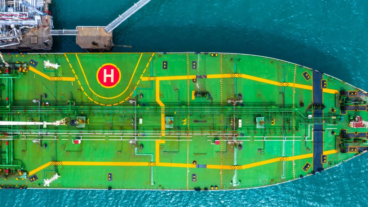 aerial top view of fuel tanker ship at the port
