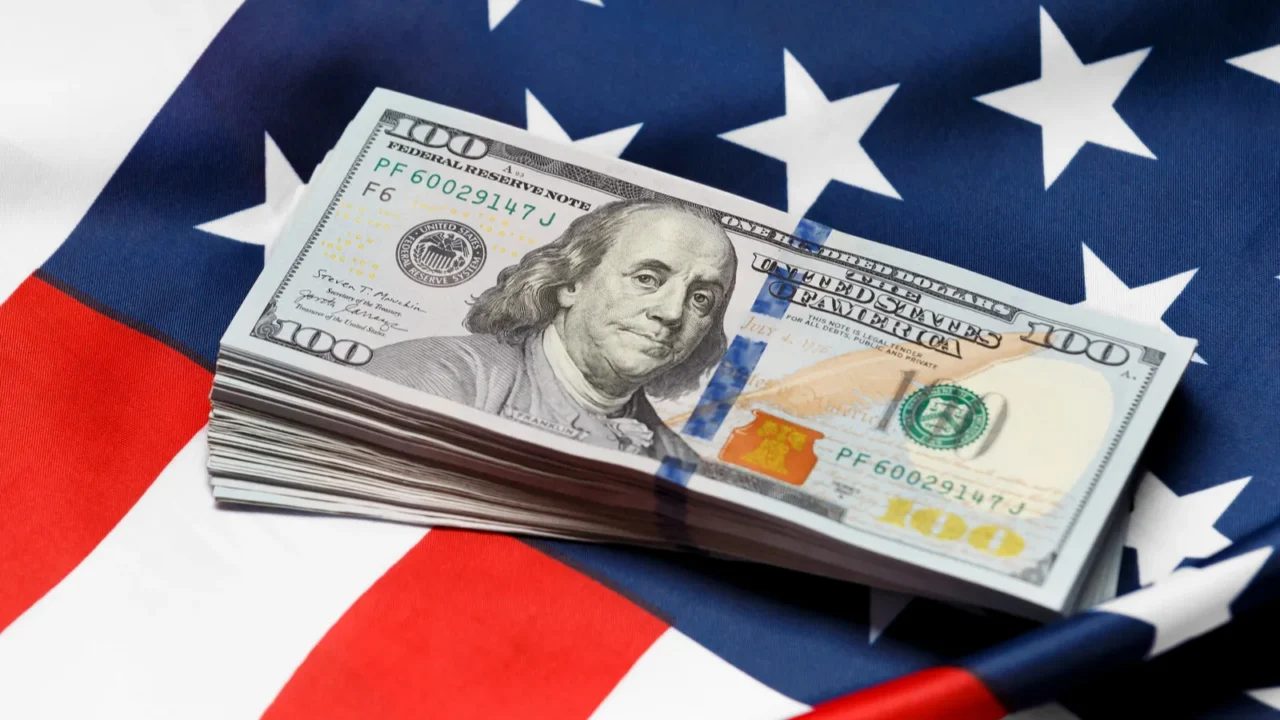 american national flag and hundred dollar bills the concept of