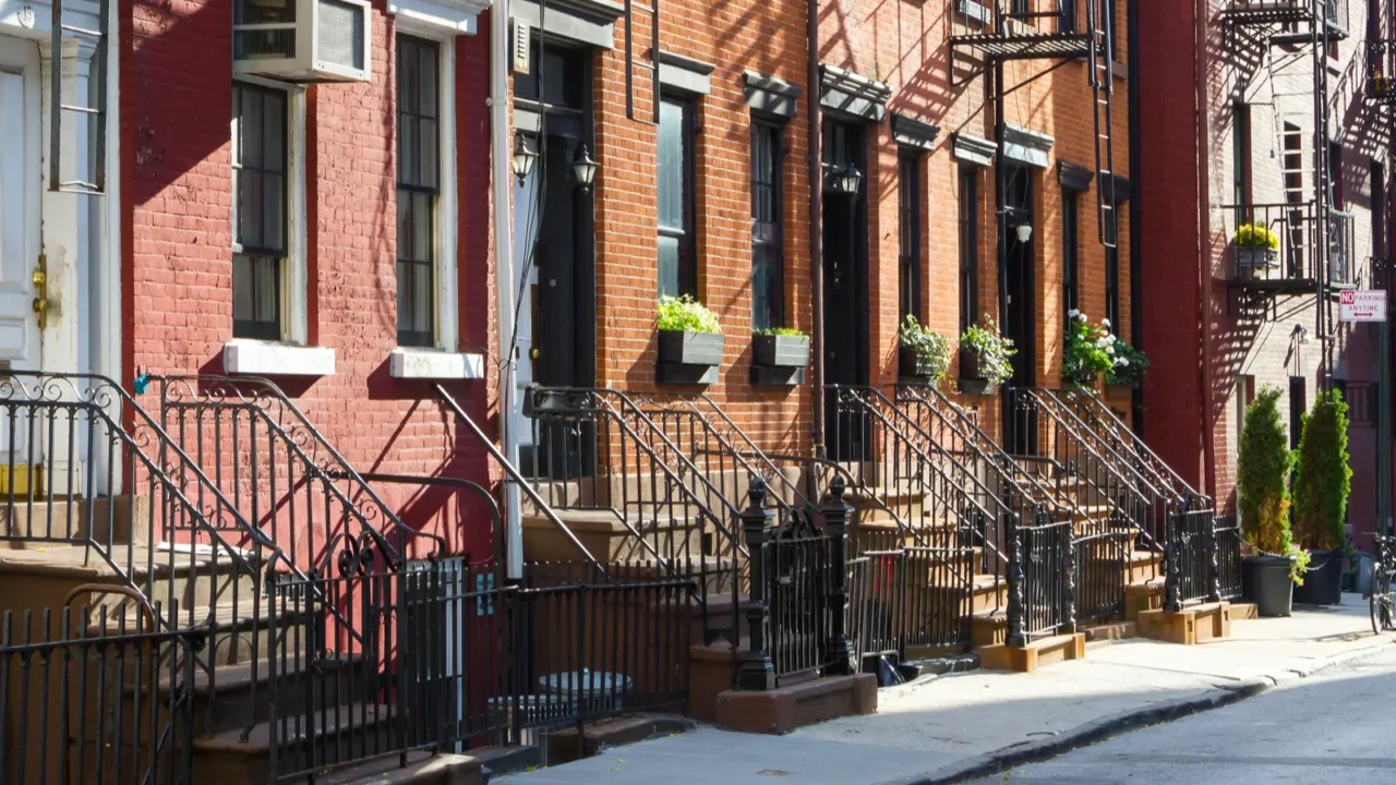 block of historic buildings on gay street in new york