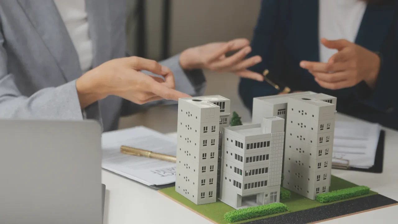 business signing a contract buy  sell house insurance agent