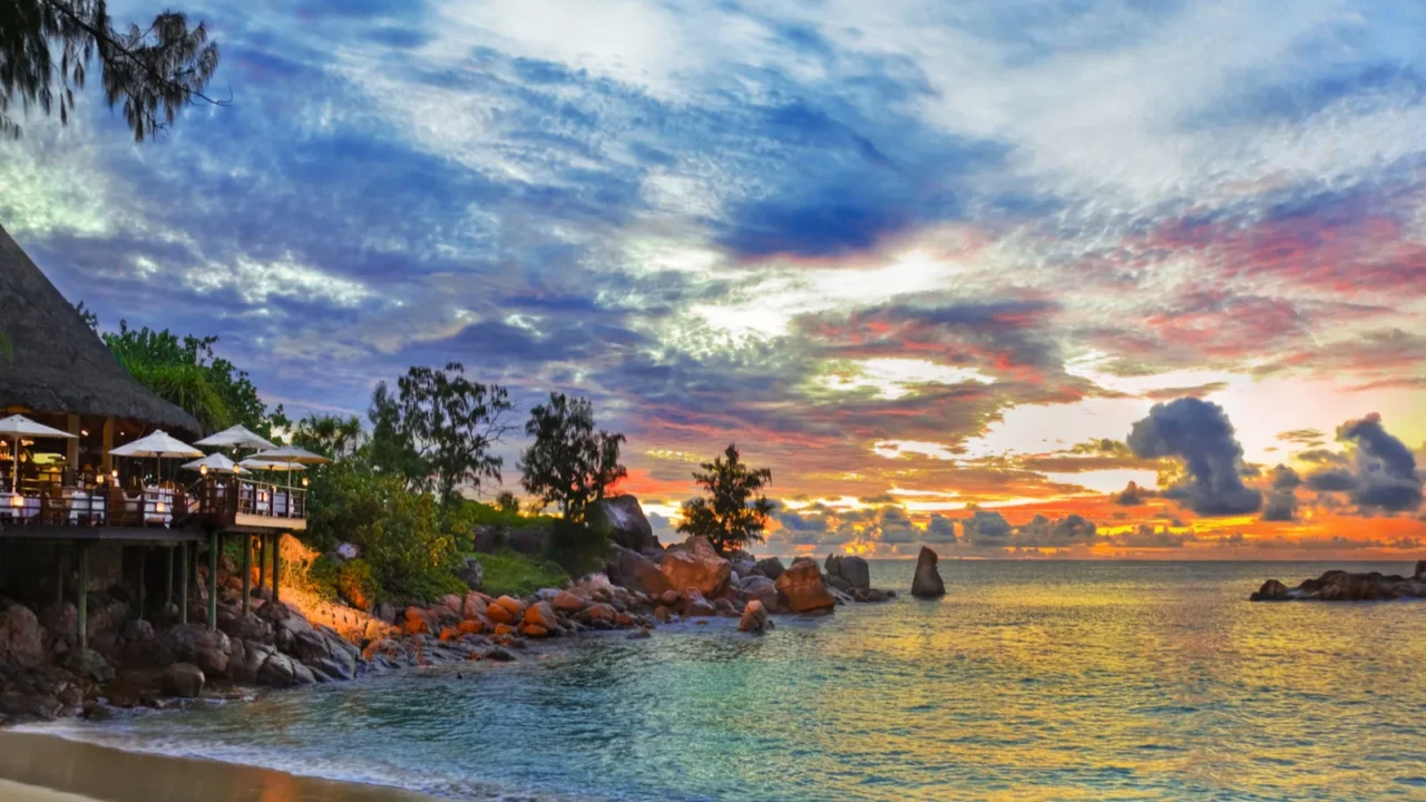 cafe on tropical beach at sunset