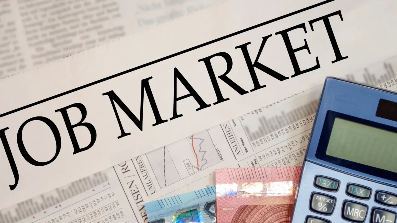 cubes dice and newspaper with job market