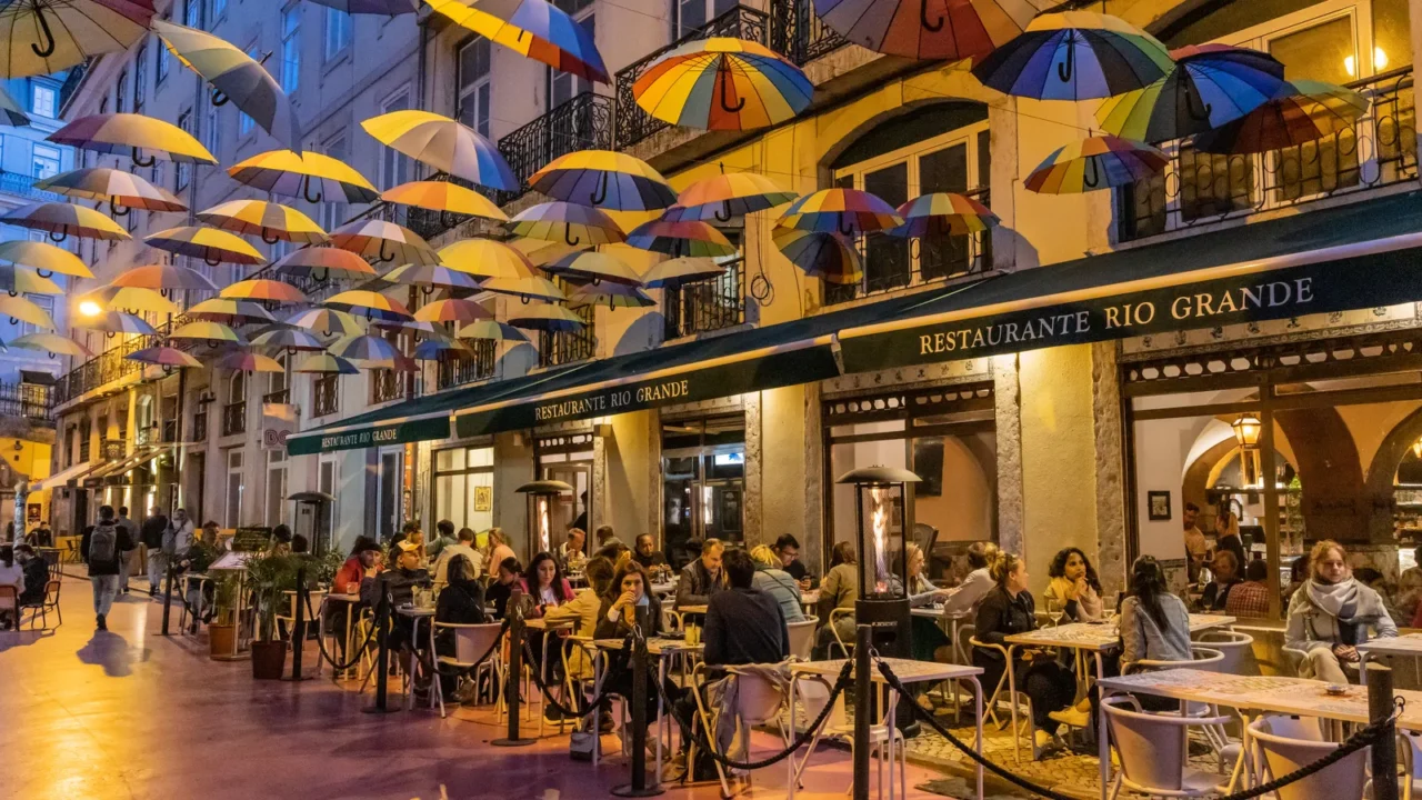 europe portugal lisbon april 18 2022 colorful umbrellas above cafes