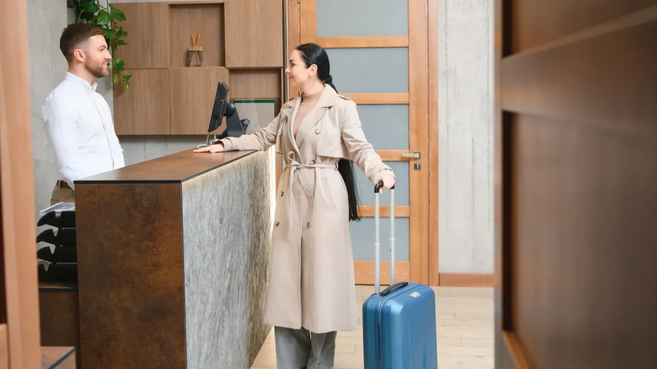female guests come with bags and suitcases to the hotel