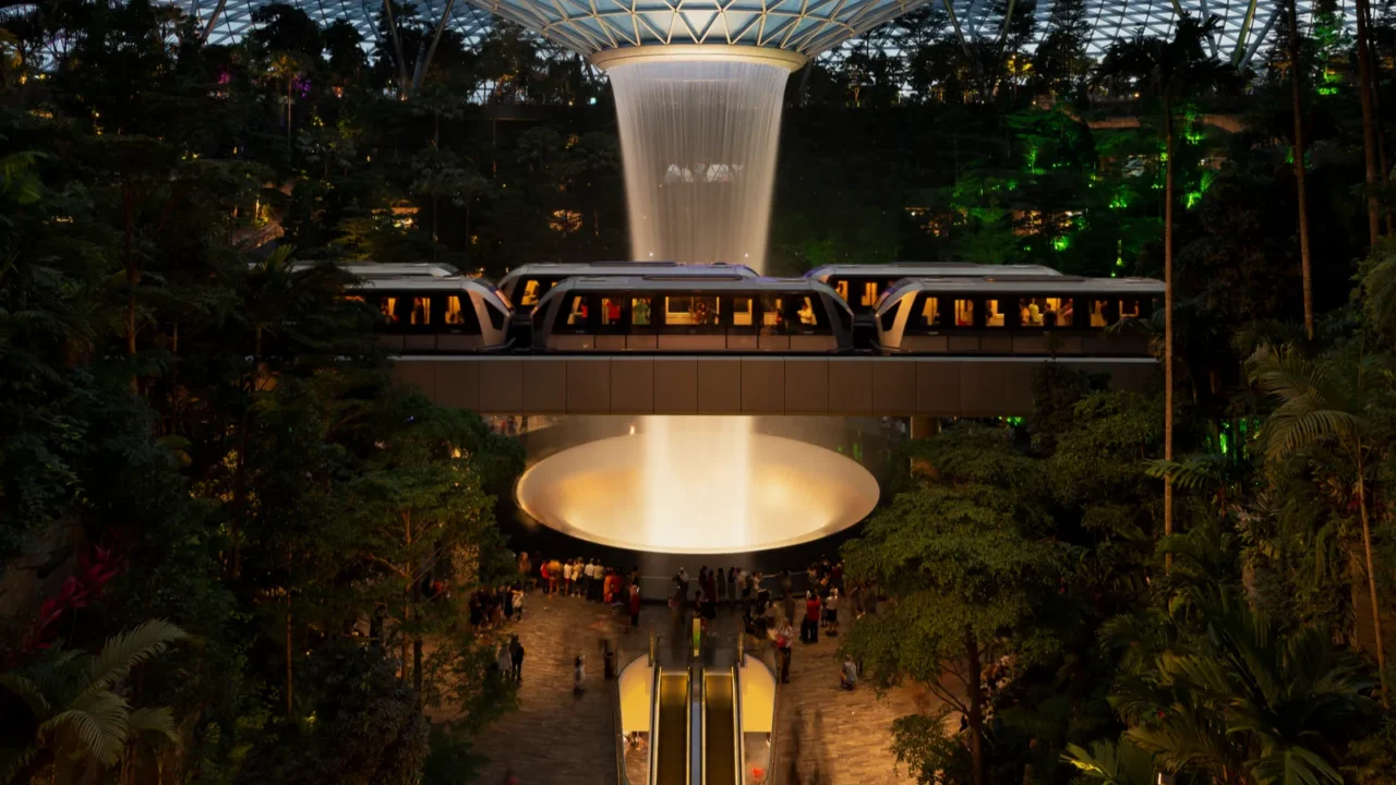 indoor waterfall at jewel changi airport at night