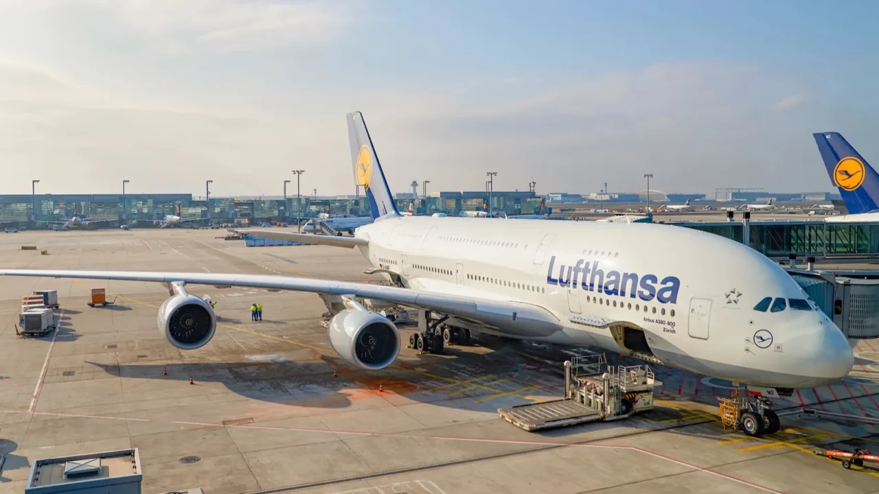 lufthansa aircraft docked in frankfurt airport