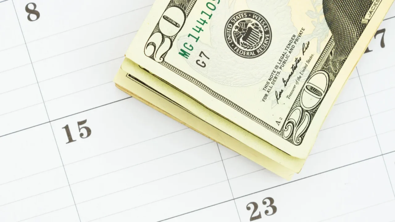 monthly calendar with 20 dollar bills