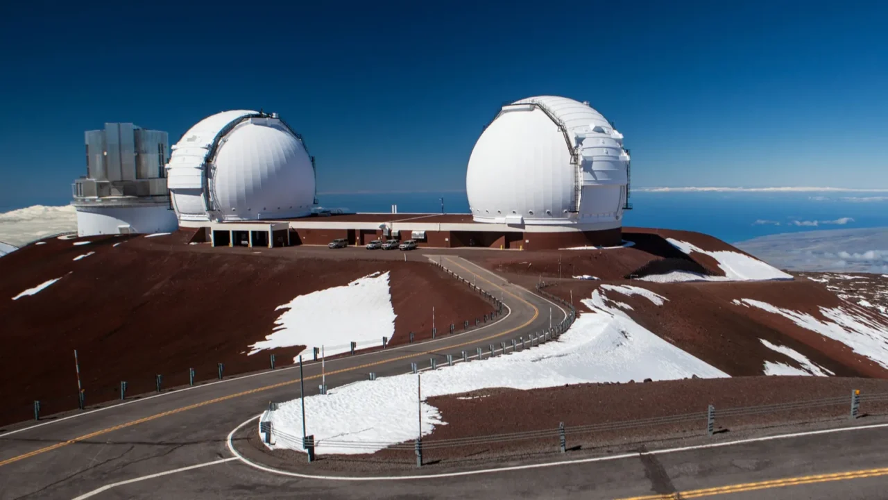 observatory domes at the peak of mauna kea volcano