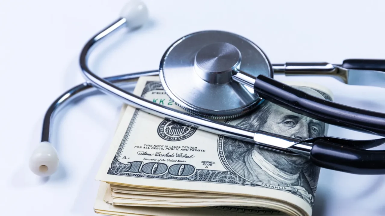 phonendoscope on american tickets concept of sanitary copayment