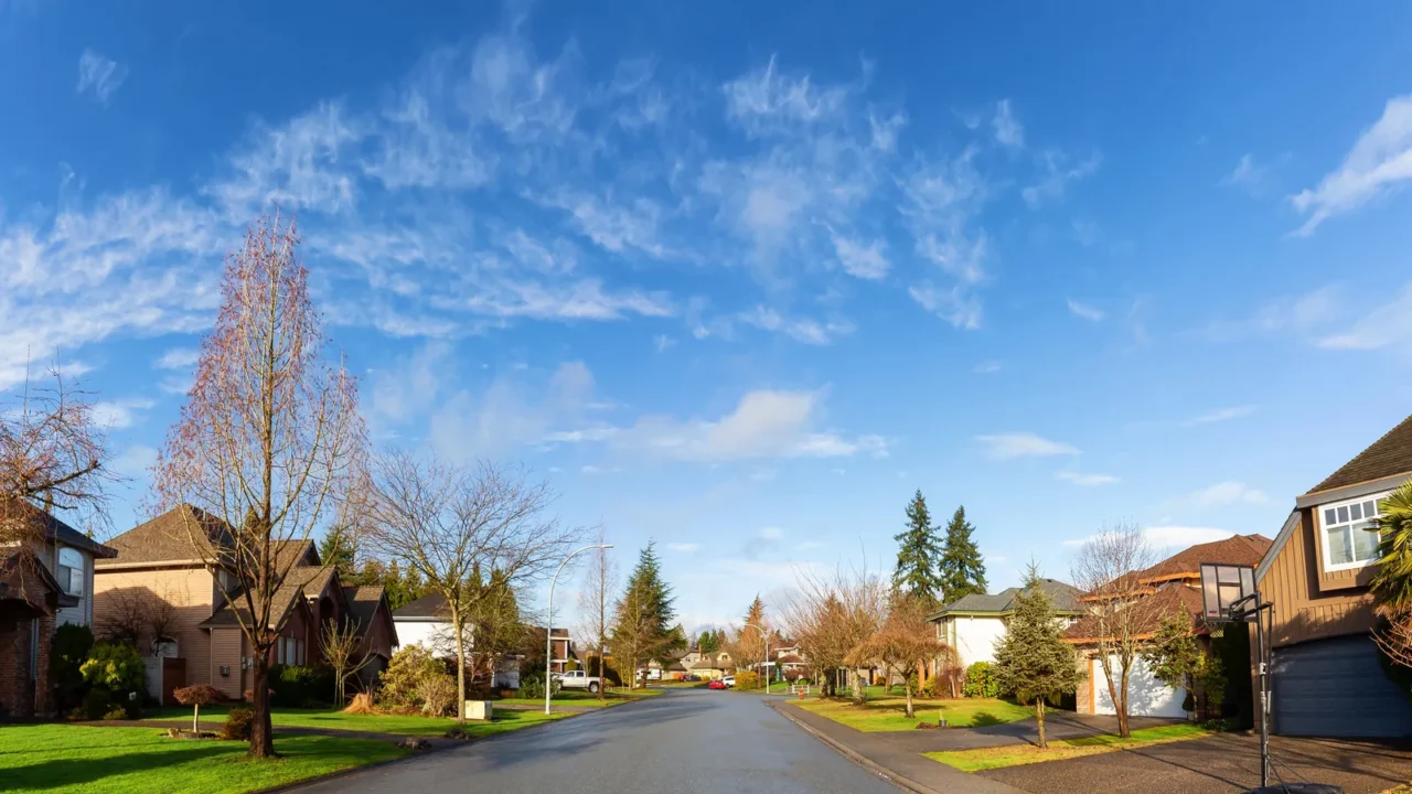 residential suburban neighborhood in the city during a vibrant winter