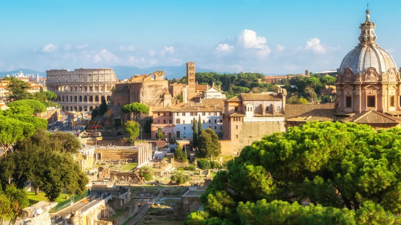 rome skyline with colosseum and roman forum italy