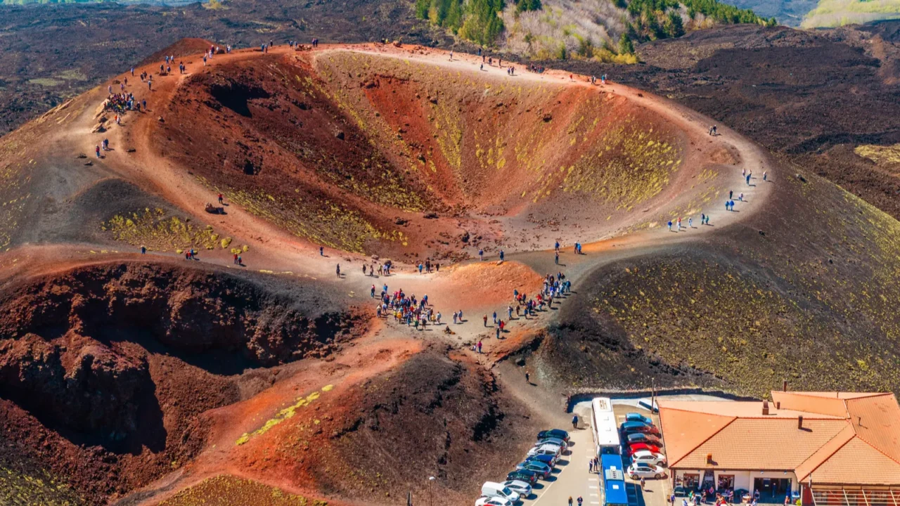 stunning view at the volcanic crater and groups of tourists